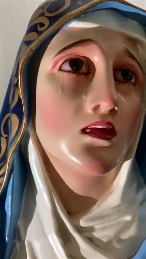 virgin mary statue tears